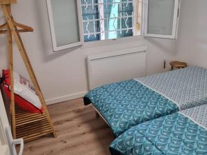 Ліжко або ліжка в номері Appartement Vieux-Boucau-les-Bains, 5 pièces, 8 personnes - FR-1-239-761