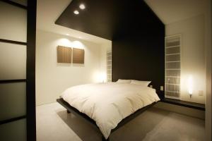 Letto o letti in una camera di Hotel Forest