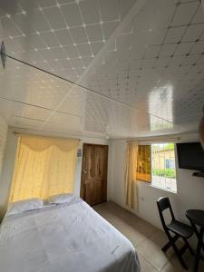 Postel nebo postele na pokoji v ubytování Suite para parejas