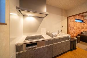A cozinha ou cozinha compacta de 石垣泉