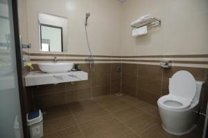 Koupelna v ubytování Nhà Nghỉ Ngọc Anh