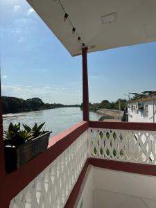 a balcony with a view of the river at Hotel Balcones del Sinu in Lorica