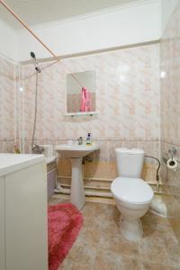 Ένα μπάνιο στο Nadezhda Apartment on Zhibek Zholy 33