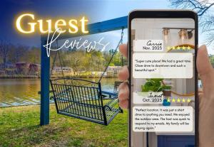 a person holding up a cell phone with a guest website at The Bungalow in Hot Springs