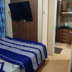 TV a/nebo společenská místnost v ubytování Sharing apartment kalibata city by alfan