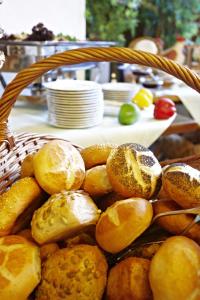 a basket filled with lots of different types of bread at Hotel Drei Mohren in Garmisch-Partenkirchen