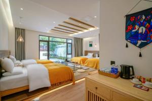 Posezení v ubytování Xisu Garden Inn
