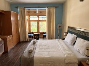 Hotel New Glacier View客房内的一张或多张床位
