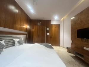 Hotel Shree Darshnam客房内的一张或多张床位