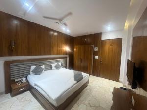 Hotel Shree Darshnam客房内的一张或多张床位