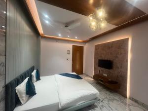 Hotel Shree Darshnam客房内的一张或多张床位