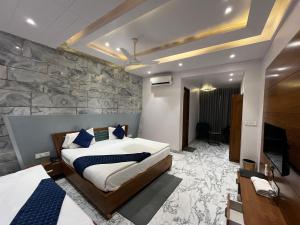Hotel Shree Darshnam客房内的一张或多张床位