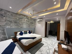 Hotel Shree Darshnam客房内的一张或多张床位