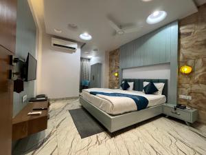 Hotel Shree Darshnam客房内的一张或多张床位