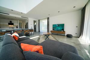 A television and/or entertainment centre at The Ni Villas Akyarlar - Bodrum