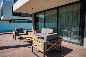 A balcony or terrace at The Ni Villas Akyarlar - Bodrum