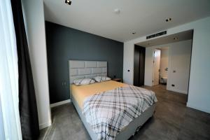 A bed or beds in a room at The Ni Villas Akyarlar - Bodrum