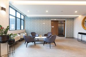 Posezení v ubytování Sandman Signature Dartmouth Hotel & Suites