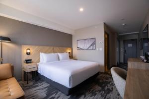 Postelja oz. postelje v sobi nastanitve Sandman Signature Dartmouth Hotel & Suites