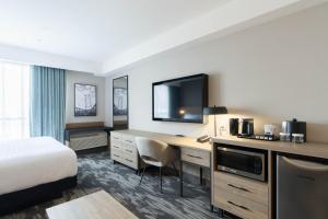 Postelja oz. postelje v sobi nastanitve Sandman Signature Dartmouth Hotel & Suites