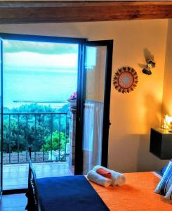 Posteľ alebo postele v izbe v ubytovaní B&B Le Anthos