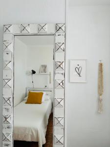 Posteľ alebo postele v izbe v ubytovaní Charming & cosy beach apartment
