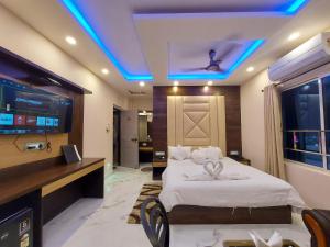 TV a/nebo společenská místnost v ubytování Balukona Beach Resort