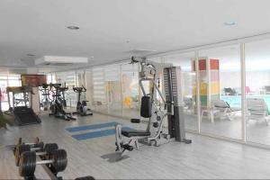 a gym with several exercise equipment in a room at Side Win Hotel & Spa in Side