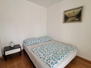 Postel nebo postele na pokoji v ubytování Apartment Lučić