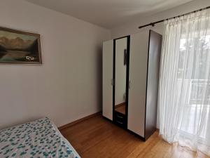 Postel nebo postele na pokoji v ubytování Apartment Lučić