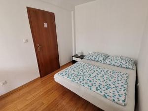 Voodi või voodid majutusasutuse Apartment Lučić toas