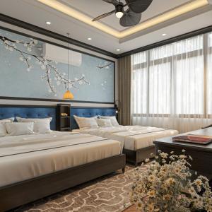 Ліжко або ліжка в номері Thuy Duong Boutique Hotel Hue