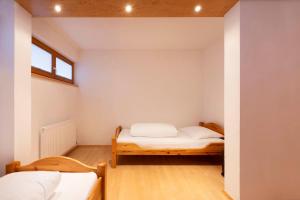 Ein Bett oder Betten in einem Zimmer der Unterkunft Hotel Bergkranz