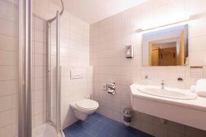 Ein Badezimmer in der Unterkunft Hotel Bergkranz