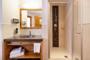 Ein Badezimmer in der Unterkunft Hotel Bergkranz