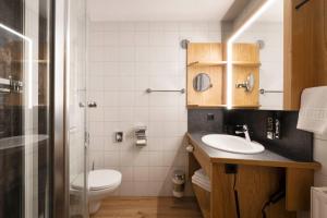 Ein Badezimmer in der Unterkunft Hotel Bergkranz