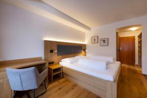 Voodi või voodid majutusasutuse Hotel Bergkranz toas