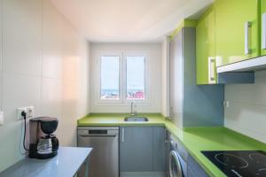 Køkken eller tekøkken på Dormir en el Palo Beach Pets Friend