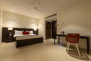 Katil atau katil-katil dalam bilik di Freesia Residency by Express Inn