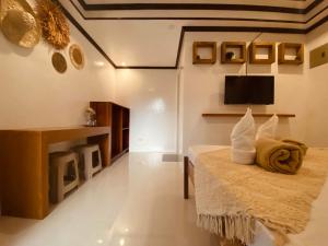 Voodi või voodid majutusasutuse General's Hideout Siargao toas