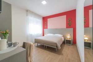 Ένα ή περισσότερα κρεβάτια σε δωμάτιο στο Residence Casadì +23 φωτογραφίες