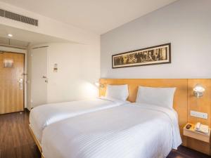 ibis Chennai Sipcot - An Accor Brand客房内的一张或多张床位