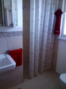 Koupelna v ubytování Apartment Bei Linda + 19 fotografií