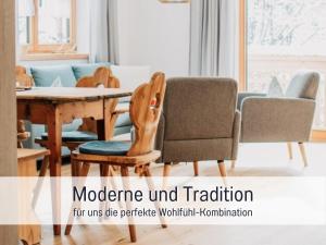 a dining room with a table and chairs at Ferienwohnungen Scholl - private Sauna oder Infrarotkabine in Bad Hindelang +237 photos