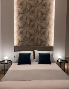 Postel nebo postele na pokoji v ubytování Astorya e’ Napoli