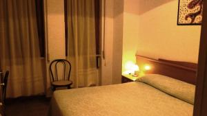 Katil atau katil-katil dalam bilik di Hotel 2 Mari - Vieste