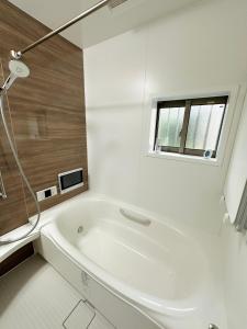 Ванная комната в Bon House Kanamachi Direct to Sensoji Skytree Disneyland Airport Free Parking