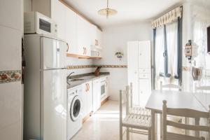 Η κουζίνα ή μικρή κουζίνα στο Apartamento Pericote +24 φωτογραφίες