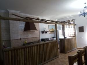 Kuchyň nebo kuchyňský kout v ubytování Oasis Aguzaderas