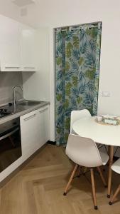 A kitchen or kitchenette at La Casetta 2,0